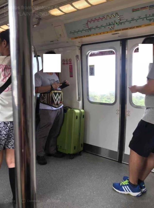 May 19: Man wear WWE Belt in MRT